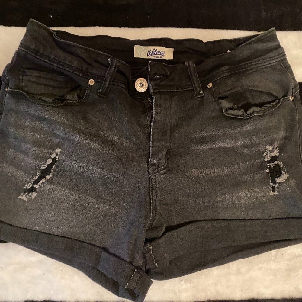 black jean shorts with slits, size 9